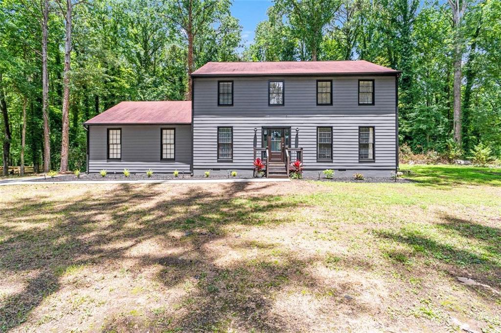This won't last. Newly renovated 4 bedroom 2.5 bath home in the highly saught after Princeton Chase neighborhood. The home sits on a large, level lot that's just under an acre in size, perfect for gatherings and family cookouts. The interior and exterior has been newly painted. Granite countertops throughout kitchen and baths. New luxury vinyl plank flooring in natural hardwood color. Fresh landscaping accents the warm exterior color of the home. Upgraded staircase with newly installed rod iron railing. Lighting recently installed to further modernize the look of the home. New airconditioners. Newer cabinets installed in kitchen and bathroom. This home is a close drive to Hartsfield-Jackson International airport and Trilith Studios.