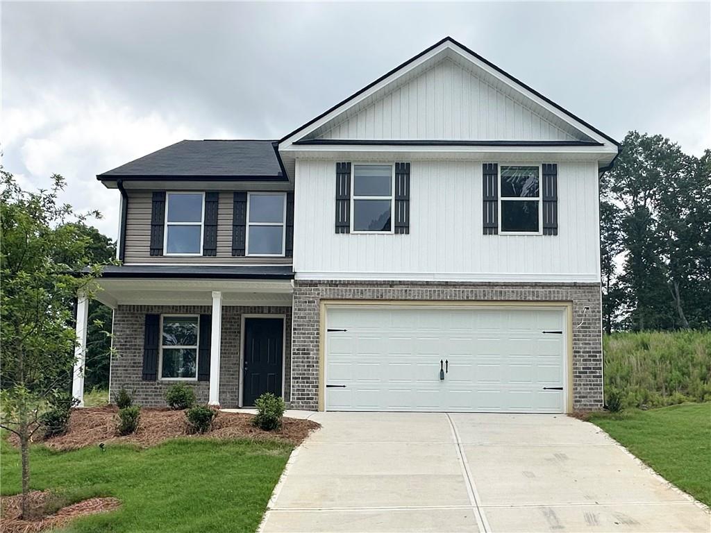 AMAZING BUILDER GIVEAWAY!!! With over 2300 total square feet, this newly built home is one of the last few new homes available in the neighborhood. For the low $300k's this is a steal. The open-concept design is perfect for family gatherings, with plenty of natural sunlight illuminating the main living areas. Included features of this home consist of a spacious open kitchen with an island that provides open views to the separate dining room, sunroom, and family room, complete with a cozy fireplace. Additional highlights include soft-close cabinets, granite countertops in both the kitchen and bathrooms, and stainless steel appliances, including a microwave, dishwasher, and electric free-standing range. On the main level, you will find LVP flooring throughout, along with a guest bedroom that has an adjacent full bathroom. The second level showcases a generously sized primary bedroom with a large walk-in closet. The primary bathroom features granite countertops, a dual vanity, and a roomy tile shower. Two additional nicely sized bedrooms and another full bathroom are also located on the second level. Don't miss out on this incredible opportunity! This home is USDA-approved, and 100% financing is available. We are offering great buyer incentives with the use of an approved lender. *Welcome Home!*