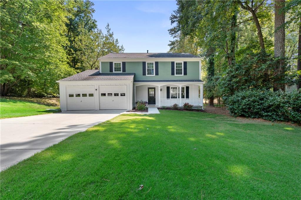Welcome to this beautifully maintained 4-bedroom, 2.5-bath home, perfectly situated on a quiet cul-de-sac lot just minutes from Downtown Norcross.
Step inside to a bright, move-in ready interior featuring fresh paint and new flooring throughout. The main level offers formal living and dining rooms with engineered hardwoods, flowing seamlessly into the light-filled kitchen. Enjoy granite countertops, stainless steel appliances, a gas stove, breakfast bar, and stylish glass-front accent cabinets—a perfect blend of function and design. Just off the kitchen, the fireside family room creates the ideal space for relaxing or entertaining.
Upstairs, retreat to the oversized primary suite with a cozy sitting area, ensuite bath, and walk-in closet. Three additional bedrooms complete the second level, including one with direct access to the hall bath—perfect for guests or extended family.
This home has been thoughtfully updated with new carpet, luxury vinyl in the bathrooms, a newer driveway, and a 5-year-old roof. Outside, the landscaped lawn with irrigation system provides curb appeal and easy maintenance.
Best of all, enjoy the convenience of no HOA and an unbeatable location—walk to Downtown Norcross and Thrasher Park, with quick access to Peachtree Industrial Blvd, Peachtree Parkway (141), and I-285.
This home truly has it all—modern updates, timeless charm, and a prime location.