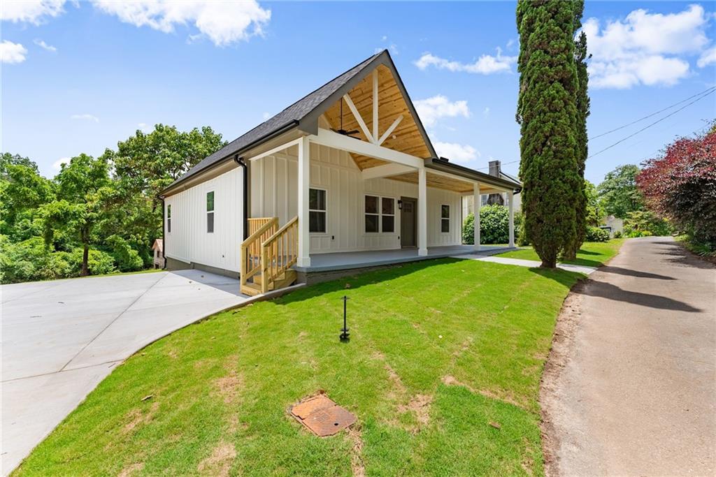 Welcome to this beautifully remodeled 3-bedroom, 2-bath home that blends timeless farmhouse charm with fresh, modern finishes. Situated on a generous 1.14-acre lot, this property offers privacy, space, and style—perfect for anyone seeking a peaceful retreat with convenience in mind. Enjoy the peace of small-town living while staying close to all the essentials. Just minutes from Highway 365, this location provides quick access to shopping, dining, schools, and outdoor recreation in Cornelia, Baldwin, and surrounding areas.
From the moment you arrive, the crisp board and batten exterior, inviting covered front porch, and fresh landscaping set the tone for what’s inside. Step through the front door to vaulted ceilings, an open-concept layout, and luxury vinyl plank flooring throughout. The heart of the home is the designer kitchen—complete with quartz countertops, custom white cabinetry, brass hardware, a stainless steel range hood, and a spacious island.
The bathrooms have been fully reimagined with elegant finishes including a double vanity, sleek black fixtures in the guest bathroom, brass fixtures in the primary suite, and floor-to-ceiling tile in both showers. Each of the three bedrooms offers comfort and natural light, making the space equally functional and inviting.
Enjoy morning coffee or evening gatherings on the spacious back deck, overlooking a lush tree-lined yard with endless potential—whether for gardening, recreation, or simply soaking in the tranquility. While also enjoying the walnut trees scattered throughout the yard. Whether you're commuting, running errands, or exploring Northeast Georgia’s natural beauty, this location puts you in the middle of it all.
With brand-new systems, stylish upgrades, and over an acre to call your own, this home is truly move-in ready. Don’t miss your chance to own this exceptional property that combines rustic charm with today’s modern comforts.