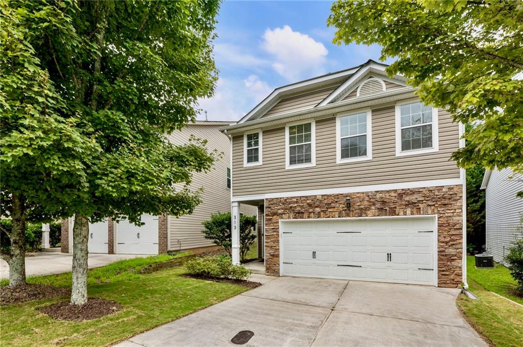 Charming, Move-In-Ready Home in Canton!
Welcome to this beautifully maintained 4-bedroom, 2.5-bath home offering 2,400 sq. ft. of living space in the highly sought-after Hidden Creek community of Canton. Built in 2009, this move-in-ready home blends timeless design with modern comfort.
The main level features a spacious open-concept layout with soaring ceilings, rich hardwood floors, and abundant natural light. At the heart of the home is the gourmet kitchen, complete with granite countertops, custom cabinetry, updated stainless steel appliances, an oversized pantry, and a breakfast bar that comfortably seats four. The kitchen flows seamlessly into a sun-filled breakfast room with views of the serene backyard and the inviting family room centered around a cozy fireplace.
Step outside to a large Trex deck, perfect for al fresco dining or relaxing by the fire pit, all set against a tranquil, tree-lined backdrop. The main floor also includes an open-concept dining room and a powder room.
Upstairs, the luxurious primary suite features a tray ceiling, a private sitting area, a spa-like bathroom, and a generous walk-in closet. Three additional bedrooms with vaulted ceilings, a full guest bath, a versatile loft (ideal for a study or home office), and a laundry room complete the upper level.
Located minutes from Downtown Canton, I-575, award-winning schools, and Blankets Creek Mountain Bike Park, this home also benefits from a flexible HOA rental policy—offering both an exceptional lifestyle and an incredible investment opportunity.