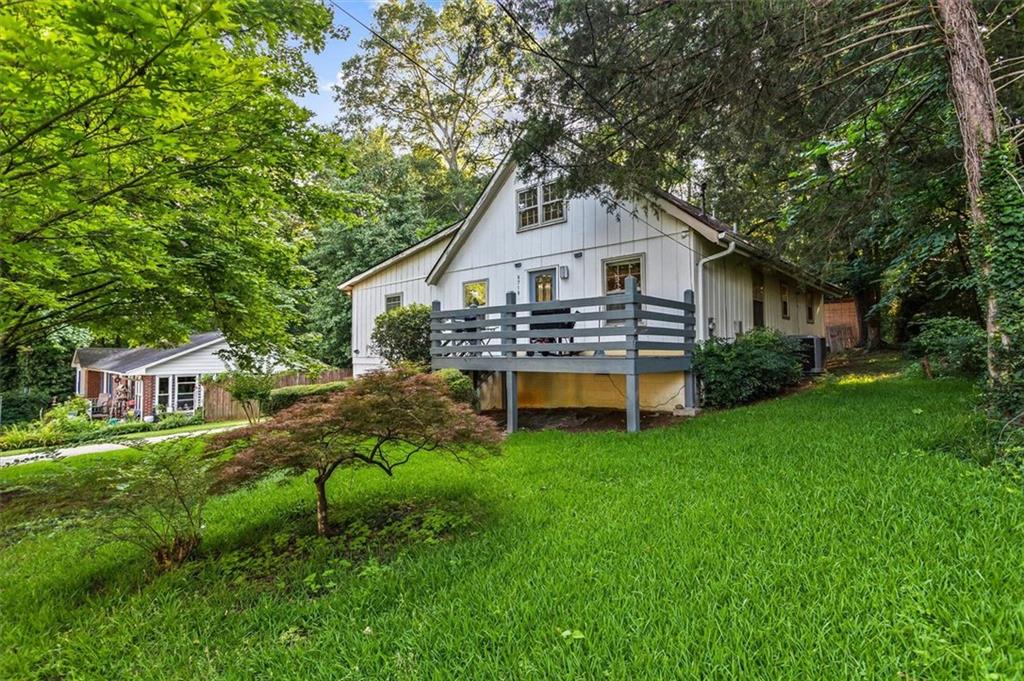 Tucked away in the peaceful Sunset Hills neighborhood, this thoughtfully updated 3-bedroom, 2.5-bath home offers the perfect blend of charm, privacy, and functionality. Inside, you’ll find wood flooring throughout the main living areas, tiled bathrooms, and a light-filled kitchen with granite countertops, subway tile backsplash, and stainless steel appliances. The kitchen island is a blank canvas—ready for you to finish to your style!
The upper-level primary suite provides added privacy, while the main floor includes two additional bedrooms, a spacious living room, and a cozy family room—great for both everyday life and entertaining.
Outside is where this home truly shines: enjoy a rocking-chair front porch, a large open back deck, a long driveway leading to the rear of the property, and a private, tree-lined backyard that offers beautiful natural views and room for outdoor toys like a boat or trailer. No HOA and convenient to shopping, parks, and major commuter routes.