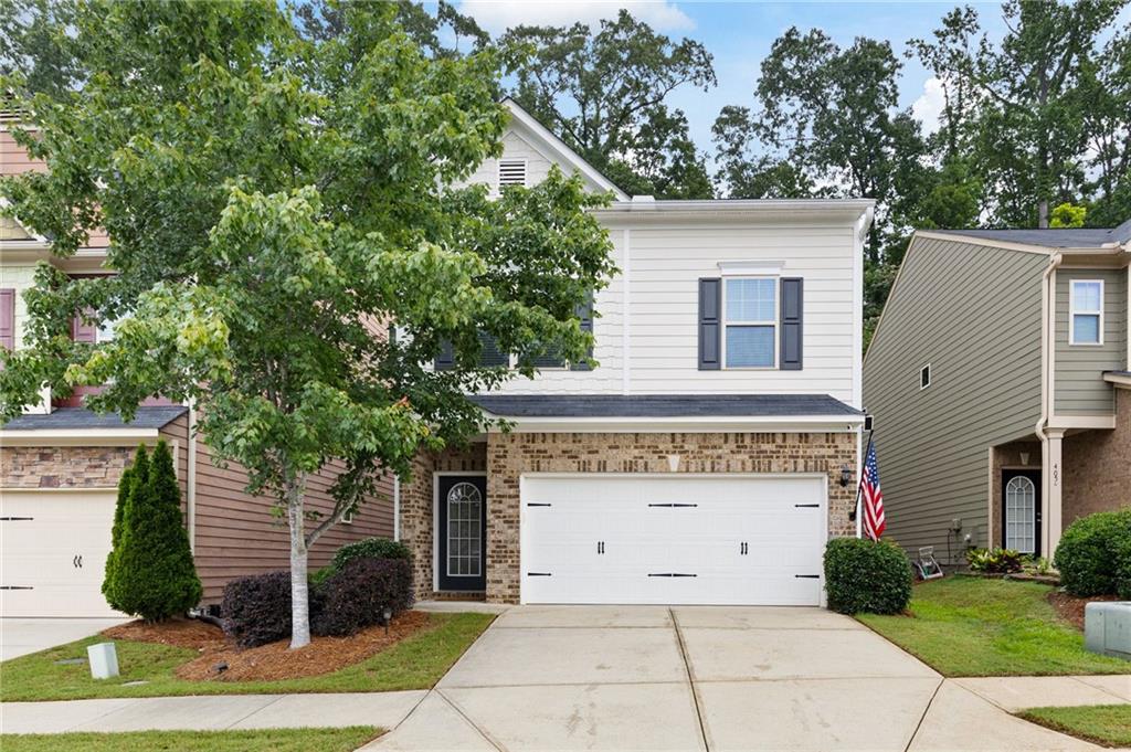 MINUTES FROM HISTORIC DOWNTOWN WOODSTOCK AND 2.5 MILES FROM I-575!! Enjoy cooking in this large, open kitchen, perfect for entertaining. Notice the gorgeous arches looking in to your family room with a cozy fireplace. Upstairs you will find an oversized master suite with vaulted ceilings and a custom built walk-in closet. Master bath is complete with a double vanity and separate soaking tub and shower. Two additional bedrooms with a full bath. Go up one more floor to find a private fourth bedroom with another full bath, perfect for a home office or media room. You will enjoy a peaceful night outside in your fully fenced private backyard. New carpets and HOA fees include your lawn maintenance! GO AND SHOW!
This home is eligible for exclusive buyer incentives when you choose to finance with our preferred lender. Lender info is in the private remarks. Ask your Realtor to obtain contact information. Benefit from options like a substantial lender credit or a special rate buydown, enhancing your purchasing power. Our preferred lender offers fast approval processes and a reputation for exceptional service, making your home buying experience smoother and more rewarding.