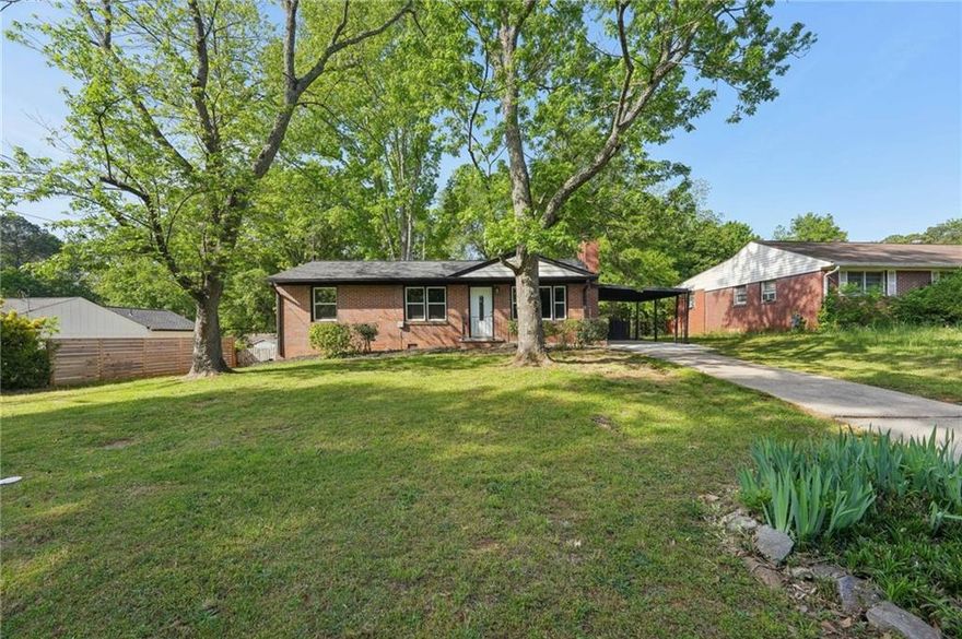 Step inside this beautifully updated 4-sided brick ranch, featuring fresh interior paint and brand-new luxury vinyl plank flooring throughout. The kitchen boasts stunning new granite countertops, sleek stainless steel appliances, and plenty of cabinetry for ample storage. This 2-bedroom, 1-bath home includes a partial unfinished basement, offering room for storage or future expansion. Enjoy outdoor living in the spacious, fenced-in backyard-perfect for entertaining or relaxing in privacy. With a brand-new roof and a prime location near major highways, top-rated schools, and popular restaurants, this move-in ready gem combines style, comfort, and convenience.