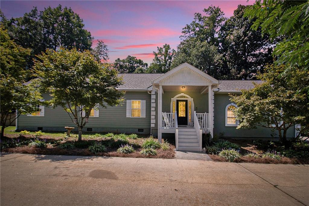 Discover this beautifully updated 4-bedroom, 2.5-bath ranch with a spacious bonus room upstairs, providing more than 2,274 sq. ft. of living space. Perfectly situated on 2.15 acres in a quiet, established neighborhood, this home combines the peace and privacy of a country setting with the convenience of being just minutes from downtown Carrollton. From the moment you arrive, you'll notice the attention to detail and care that has gone into maintaining this property. The home has been freshly painted inside and out, offering a clean, modern look. Major systems have been updated for your peace of mind - the roof is just one year old, the hot water heater is brand new, the AC unit has been professionally serviced and cleaned, and the septic tank has been recently maintained. Step inside to find 2" hardwood floors flowing throughout the main level, creating a warm and inviting atmosphere. The open layout offers great flow between the living spaces, making this home ideal for everyday living and entertaining. Large windows provide abundant natural light, highlighting the home's fresh updates. The upstairs bonus room serves as the 4th bedroom but could easily function as a home office, playroom, gym, or media room - the possibilities are endless. Outdoors, the beautifully landscaped yard enhances the home's curb appeal, while the private backyard provides the perfect retreat for quiet evenings or weekend gatherings. A large pole barn remains with the property, offering excellent storage space or room for a workshop, hobby area, or additional parking. This home is completely electric - no gas required - and designed for low-maintenance living. Its location offers the perfect balance of seclusion and accessibility, with schools, shopping, dining, and downtown Carrollton just minutes away. If you've been searching for a move-in ready home with acreage, updates, and room to grow, 225 Meadowcliff Trail is the one to see. Schedule your showing today and experience everything this property has to offer.