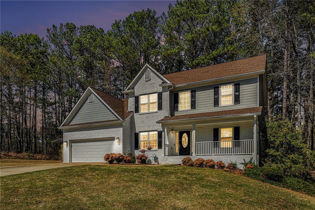 Welcome to 2404 CaneRidge Pointe SW, a stunning brick-front home nestled in the highly sought-after Hillgrove High School district. This elegant 5-bedroom, 4-bathroom residence boasts over 3,000 square feet of thoughtfully designed living space, over a FULL FINISHED BASEMENT blending timeless charm with modern convenience. Step inside to discover an inviting open floor plan, where natural light pours through large windows, highlighting the gleaming hardwood floors and sophisticated architectural details. The heart of the home is the spacious living area, complete with a cozy fireplace-perfect for gatherings or quiet evenings in. The chef's kitchen features granite countertops, stainless steel appliances, and ample cabinetry, seamlessly flowing into the breakfast nook and formal dining room. Retreat to the expansive primary suite, a true sanctuary with a spa-like ensuite bath, dual vanities, a soaking tub, and a walk-in closet. Generously sized secondary bedrooms provide comfort and versatility, while the fully finished basement offers endless possibilities-whether as a media room, home gym, or additional guest suite. Outside, enjoy a private backyard oasis, ideal for entertaining or simply unwinding. Situated in a beautiful, well-established community with a low HOA, this home offers both tranquility and convenience, just moments from top-rated schools, shopping, and dining. Don't miss the opportunity to own this exceptional home in one of West Cobb's most desirable neighborhoods!