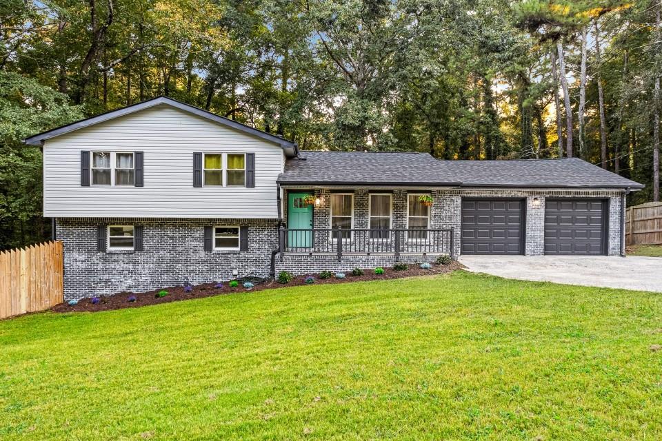 Have you ever imagined having a resort in your own backyard? At 8267 Freestone in Jonesboro, GA, that dream becomes reality! This beautifully renovated home offers modern updates, comfort, and style both inside and out. Step inside to discover a bright and inviting space with newly installed front windows, fresh interior and exterior paint, and new flooring throughout. The home is enhanced with all new recessed lighting, ceiling fans, and stylish wall fixtures with an integrated fireplace for cozy evenings. The upgraded kitchen features new appliances with a hood range and an elegant lighting package, perfect for the home chef. The basement has been transformed with a new bedroom and a full bathroom, ideal for guests, in-laws, or flexible living space. Bathrooms across the home have been remodeled with new vanities and toilets, while the furnace has been serviced and paired with a new thermostat and new water heater for efficiency and peace of mind. Outside is your personal retreat: a brand-new deck, repaired and renovated gazebo with walkway, and a cleaned and serviced pool nestled in an oversized yard with a park-like setting. It's truly all the win-wins - relaxation, recreation, and entertainment in one. Additional updates include a new roof, new automatic garage doors with motors, and newly installed interior and exterior doors throughout. Every detail has been thoughtfully updated, making this home move-in ready and unlike anything else on the market. Don't miss your chance to own this one-of-a-kind property in a serene Jonesboro setting!