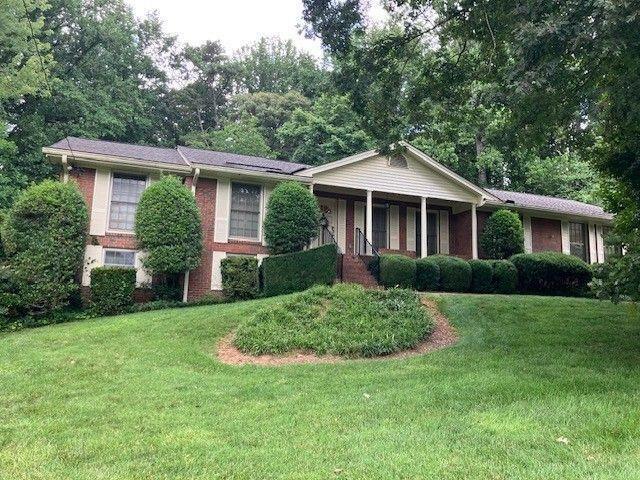 Nestled on a picturesque wooded lot, this inviting three bedroom, two and half bath home offers the perfect blend of comfort, privacy and outdoor living. Living room opens to separate dining room. Eat-in kitchen overlooks the scenic backyard. The finished basement provides additional living space with game room, two offices, half bath and workshop. Ready for your personal touches.