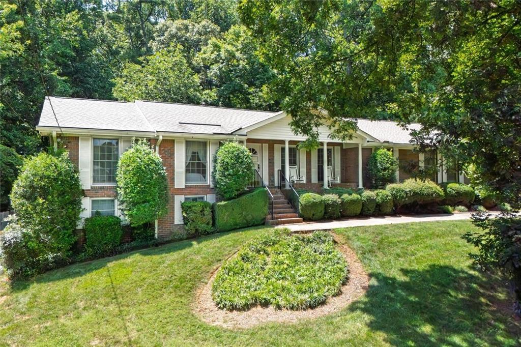 Nestled on a picturesque wooded lot, this inviting three bedroom, two and half bath home offers the perfect blend of comfort, privacy and outdoor living. Custom built 4 sided brick home . Living room opens to separate dining room. Huge eat-in kitchen overlooks the lush, professionally landscaped backyard. The den overlooks the patio and beautiful pool area The finished basement provides additional living space with recreation room, two offices, half bath and workshop. Original Owner. Home has been well maintained but is ready for your personal touches! 2 year old roof, newer driveway. Convenient to Silver Comet Trail, 285 and Hartsfield Airport.