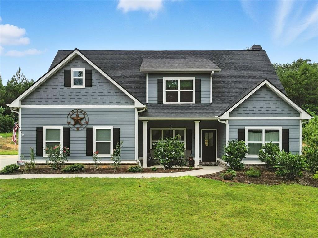 This beautifully updated craftsman-style home offers the perfect blend of comfort, function, and privacy—nestled on 6.47 serene acres just minutes from Downtown Tallapoosa and with no HOA.
The main level features a desirable primary suite with custom-tiled bathroom, along with a second bedroom and full bath, ideal for guests or a home office. Upstairs, you'll find two additional bedrooms, a full bath, and a spacious finished bonus room—perfect for a media room, playroom, or extra guest space.
The open-concept floor plan centers around a large kitchen island overlooking the vaulted family room, ideal for entertaining. Granite/quartz countertops, stainless steel appliances, hardwood floors, and detailed finishes throughout provide both beauty and durability.
Since purchasing the home, the owners have invested over $65,000 in upgrades, including: private pool with surrounding sidewalk and electrical outlets, white vinyl privacy fencing around the pool area, approximately 4 acres fully fenced with two gated entrances, two new storage sheds and expanded concrete pad for additional parking.
With acreage, upgrades, and charm, this property offers the freedom of country living without sacrificing modern comfort. Schedule your tour today to experience all it has to offer!