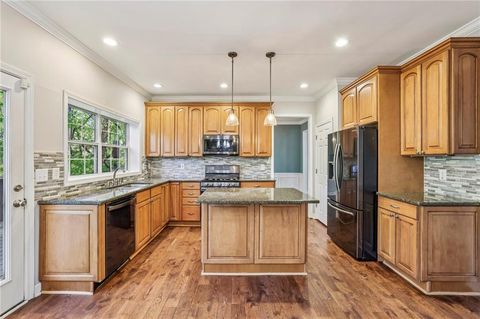 Photo of 615 Tammany Pointe, Alpharetta, GA 30004 (MLS # 7744415)