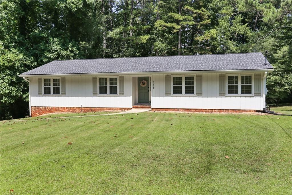 Absolutely wonderful RENOVATED RANCH sought after close in Woodstock! RENOVATED oversized kitchen with granite counter tops, stainless steel appliances, custom cabinetry and more! Formal LR/office, great dining room, cozy family room with fireplace. Completely RENOVATED BATHS, Updated ROOF, Updated HVAC, Updated PLUMBING throughout house. Portion of the basement has been finished, waterproofed, and sealed. Custom heart of pine staircase to lower level with media/family room - could be used as a home office or 4th bedroom! Must see to believe! Large guest bedrooms, hardwood flooring throughout home! Workshop/Utility/Laundry Room! 2 car garage & large private deck overlooking level Fenced yard