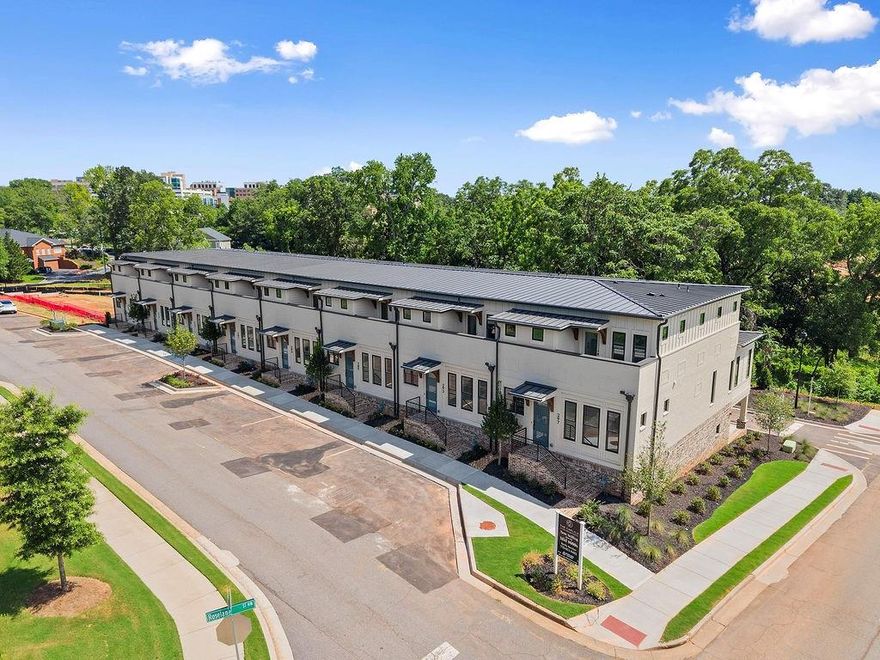 Introducing The Carlyle — Bercher Homes’ newest boutique community, featuring 16 elegant townhomes. From the moment you step inside, you’ll know you’ve found the one. The spacious kitchen impresses with white soft-close cabinetry, beautiful quartz countertops, and a large island with seating—perfect for entertaining. Enjoy cooking with premium Bosch stainless steel appliances, including a 5-burner gas cooktop and a built-in microwave drawer. The kitchen flows seamlessly into the family room, which features a cozy gas fireplace with a stunning mantel and tile surround, plus glass sliding doors leading to your private deck.  A separate dining room offers space for family gatherings or dinner parties, while a main-level guest suite includes a stylish tile bathroom with a walk-in shower. Upstairs, the primary suite showcases hardwood floors, two spacious closets, and a luxurious bath complete with double vanities, a freestanding tub, and elegant tile finishes. Every home is elevator-ready and features Craftsman-style trim throughout.  Located close to Marietta Square and Kennestone Hospital, The Carlyle offers an easy commute to The Battery Atlanta. Enjoy “white glove” smart home service from Phoenix Systems, including a video doorbell with analytics, WiFi thermostat, WiFi LiftMaster garage door opener, and WiFi extender. Each home includes a 1-year builder warranty and an 8-year structural warranty. The community association handles yard maintenance, giving you more time to explore all that Marietta has to offer—including a dog park for your four-legged friends. Take advantage of our introductory pricing and make your move to The Carlyle today! The decorated model home is open for tours by appointment.