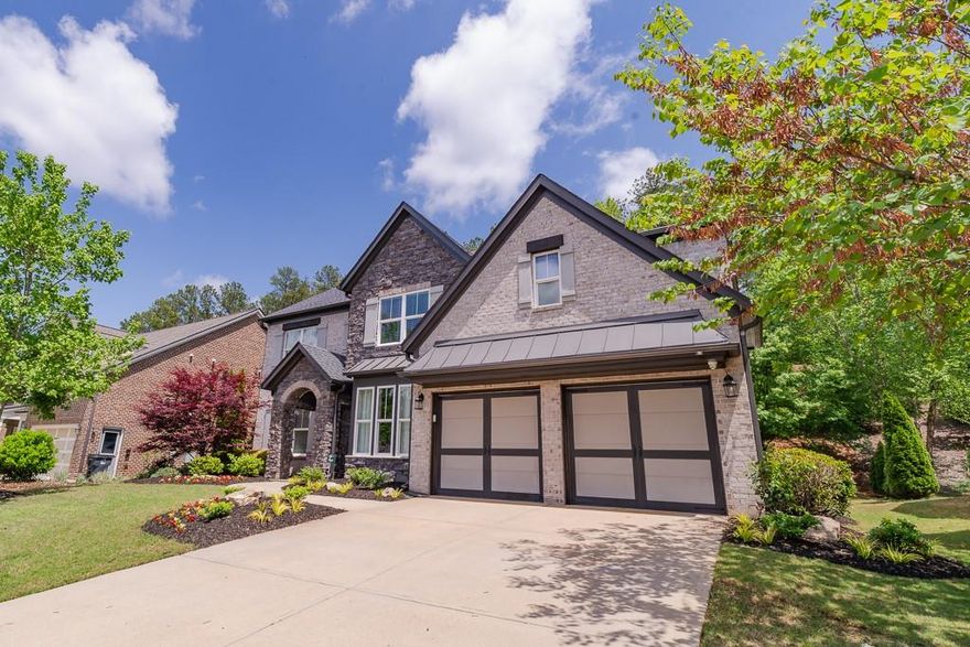 Welcome to this stunning home in the highly sought-after Provence community in Cumming! This beautifully maintained residence offers 5 spacious bedrooms and 4 full bathrooms, perfectly blending luxury, comfort, and functionality. Step into the elegant two-story foyer, flanked by a formal dining room and a private office or flex space. The chef’s kitchen features granite countertops, stainless steel appliances, a large island, and a walk-in pantry — ideal for entertaining or everyday living. The kitchen opens to the inviting living room with a cozy fireplace and abundant natural light, creating a warm and welcoming atmosphere.

The main level offers a guest suite with a full bath, perfect for visitors or multi-generational living. Upstairs, retreat to the luxurious owner’s suite with a spa-inspired bath and oversized walk-in closet, along with three additional bedrooms and a versatile loft space. Step outside to the open patio and private, landscaped backyard — perfect for outdoor dining or relaxation.

Located in the award-winning South Forsyth school district and just minutes from shopping, dining, and GA-400, this home also offers access to Provence’s exceptional amenities, including swim, tennis, clubhouse, and playground. Don’t miss this incredible opportunity — schedule your showing today!