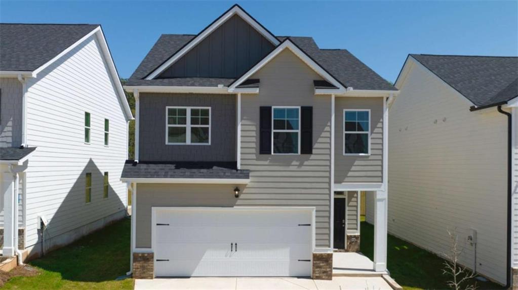 Gated Community with easy access to Interstate 75 & Atlanta Hartsfield Airport. Luxury living at an Affordable price. The Somerset plan, Beautiful oversized owner's suite & spa like bath with separate shower, Double vanities and spacious walk-in closet. Tons of nearby shopping and fine dining. This floor plan has 4 Bedrooms 2.5 Baths, Hardwood (LVP) on main. Huge family room opens to a chef kitchen large enough to host extended parties with a long Kitchen Island. Dining room area opens up endless possibilities. Home Is Smart Home Connected. Your new home is built with an industry leading suite of smart home products that keep you connected with the people and place you value most.