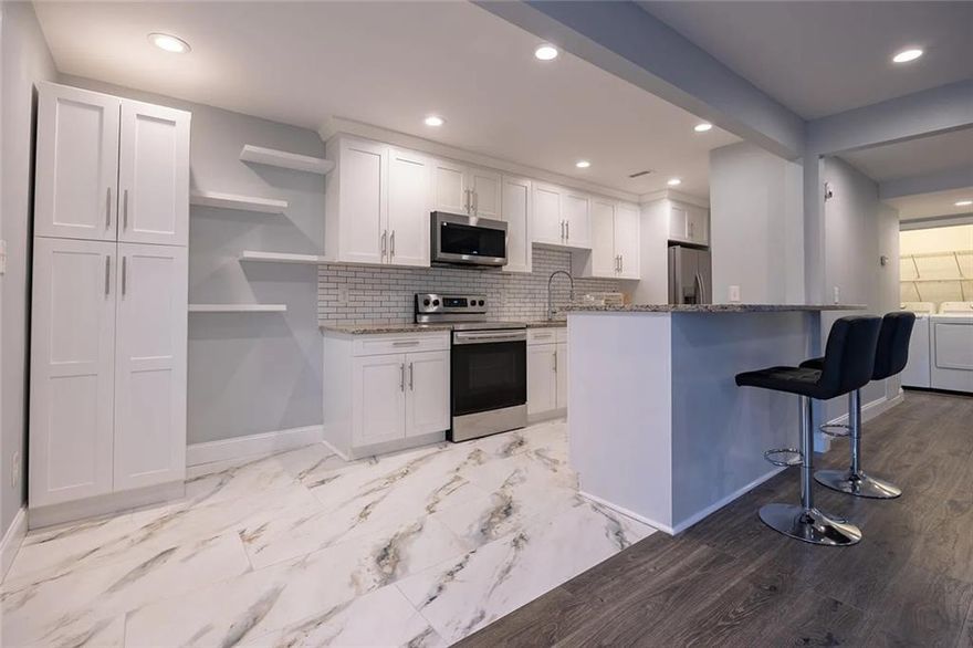 Newly renovated 3 bedrooms and 2.5 bathrooms townhouse with fully furnished brand-new furniture plus Washer and dryer located in the highly sought-after top East Cobb school district (Walton High, Dickerson Middle, and Sope Creek Elementary). 
This beautiful home features a bright and open floor plan, freshly painted interior walls, beautiful new flooring throughout. The updated kitchen offers white cabinets, granite countertops, and modern appliances including an electric smooth top stove, microwave, dishwasher, and refrigerator. Open living and dining areas, Eat-in kitchen. The bathrooms have been upgraded with marble finishes, updated vanities, and granite countertops.
1-car garage with plenty of storage space. More cars can park at front driveway. Located in a safe, quiet neighborhood. Convenient to shopping, restaurants, parks, and recreation. Easy access to I-285, Sandy Springs, The Battery Atlanta, and Downtown Atlanta for work. 
Simply move in and enjoy the convenience of a modern, fully furnished home in one of the best school districts in Georgia. (If no need for furniture, the lease price is $2300 per month.)