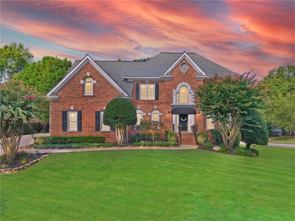 Wow! This is the one you’ve been waiting for! Welcome Home to this completely renovated 5 bed, 5 bath, 3-car garage home in the highly sought-after Alpharetta/Johns Creek swim/tennis community of Chartwell! This 4-sided brick beauty has been lovingly maintained by its owners of 27 years! The spacious main living level includes a welcoming two-story foyer, formal living room, formal dining room, convenient guest bedroom and full bathroom, vaulted fireside family room, and showcase eat-in kitchen complete with stone countertops, top-of-the line appliances (Wolf, Subzero, Bosch, Sharp), pot-filler, island, breakfast bar with beverage cooler, wall of windows, and adjacent sun-filled breakfast area. Additionally on the main level, you’ll find the fabulous vaulted covered deck with beautiful stone and brick wood-burning fireplace! Upstairs, you’ll find 3 spacious guest bedrooms— one with an ensuite bath, two sharing a Jack and Jill bath, and the beautiful primary bedroom with luxurious tray ceiling detail, newly renovated ensuite bath with dual vanities, enormous walk-in shower, and large custom walk-in closet! The full, finished walk-out daylight terrace level includes a large multi-purpose space, additional family room, kitchenette with full refrigerator, microwave, sink and beverage cooler, and a full guest bathroom. Outside on the terrace level, you’ll find a large patio with both covered and uncovered areas, with upgraded convenient, low-maintenance epoxy coating. A fence enclosure makes this patio area pet-friendly! Huge Corner lot adjacent to multiple cul-de-sacs. Newer HVAC, newer windows! Chartwell community includes pool, tennis courts, clubhouse, playground, and a community lake, and is located just steps to Newtown Park, shopping, restaurants, and more! Easy access to GA 400! DON’T WAIT, be sure to schedule your showings ASAP!