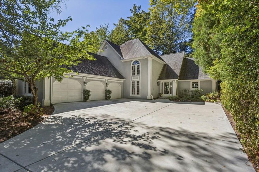 Executive Retreat in Prime Collier Hills Under $1,000,000! Experience the perfect blend of luxury, convenience, and functionality in this stunning 3-bedroom, 3-full bathroom, 3 car garage home. The residence is designed for modern living with an expansive, open-concept main level and a true chef's kitchen featuring a premium Sub-Zero refrigerator. The main level also offers a highly desirable separate office space, perfect for remote work or a quiet study. Furthermore, enjoy the rare and highly sought-after feature of a Primary Suite on the Main Level. Beyond the interiors, the home boasts a fantastic walk-out backyard with artificial turf, and the ultimate bonus: a three-car garage with an attached, dedicated workshop. It is tucked well back from Northside Drive, secluded by a buffer of mature trees, providing a peaceful and private setting while keeping you seconds from the city's heart. Location is everything: you're just 0.5 miles to I-75 access, 0.9 miles to the BeltLine's Northside Trail, and even closer to Tanyard Creek Park. You're centrally positioned for easy access to Buckhead, Midtown, and Westside Atlanta, and just 1.2 miles to Piedmont Hospital. Zoned for the highly desirable Morris Brandon Elementary school district.