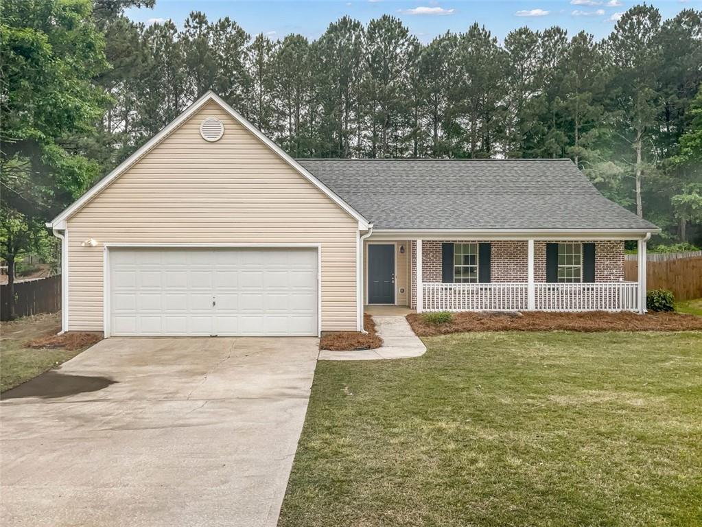 Welcome Home! This 3 bed, 2 bath cute and cozy ranch is located in the quiet subdivision of Victoria Place. The eat-in kitchen is sure to please with white cabinets and views of the family room. The primary bedroom offers a walk-in closet and bath with double vanity, soaking tub and separate shower. Beautiful vinyl flooring throughout with tile in kitchen and baths, Step outside to the screened-in patio in the fenced-in level backyard perfect for entertaining family and friends. Great schools and convenient to Hwy 78 and Hwy 81.