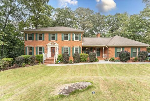 Photo of 5027 Castlewood Drive SW, Lilburn, GA 30047 (MLS # 7658345)