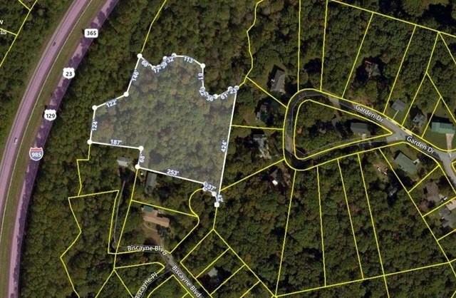 Nestled at the end of a peaceful cul-de-sac in an established community, Lot 143 on Biscayne Place offers the perfect blend of privacy, convenience, and natural beauty. This rare 3.8-acre tract is an ideal canvas for your custom home, with plenty of space for outdoor living, a garden, or even a workshop.
Enjoy a serene, wooded setting just minutes from I-985, Lake Lanier, Northeast Georgia Medical Center, shopping, and dining in downtown Gainesville. Utilities such as electricity and water are already available at the street, making your build that much easier. No HOA means you can design your property to fit your lifestyle without restrictive covenants.