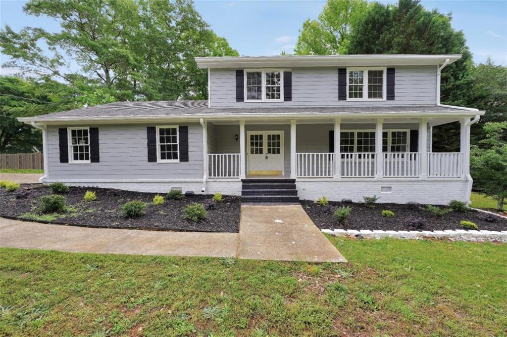 Welcome! This beautifully renovated traditional home sits on a spacious corner lot in a quiet neighborhood. Inside, you'll find 4 bedrooms and 2 full bathrooms upstairs, plus a convenient half bathroom downstairs. The layout is classic and functional, with a cozy sunroom perfect for relaxing or entertaining. The entire home has been updated with brand new windows and appliances - move-in ready with modern upgrades throughout. Roof is 5 years old and has a brand new water heater. Check it out for yourself!