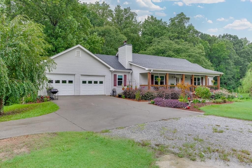 For Sale RANCH Plan on Full Basement FIRST TIME ON MARKET -Nestled in the tranquil countryside of Dacula, GA, this well maintained TRUE RANCH PLAN on FULL Unfinished Basement property offers a perfect blend of rural serenity and modern convenience. With its expansive lot and inviting home, it's an ideal setting for those seeking a peaceful escape while still being within reach of local amenities and major roadways. Features include: 1.71 acres +/- with no HOA (room to build a 2nd house?), ample outdoor space for gardening and entertaining, true ranch plan on full unfinished basement with BoatDoor, three bedrooms and two full baths, country kitchen and comfortable living room. Deck off the kitchen overlooking private partially fenced backyard, oversized two car attached garage plus detached covered RV parking. PLS NOTE: Public SF is stated incorreclty. This property offers tons of opportunities!