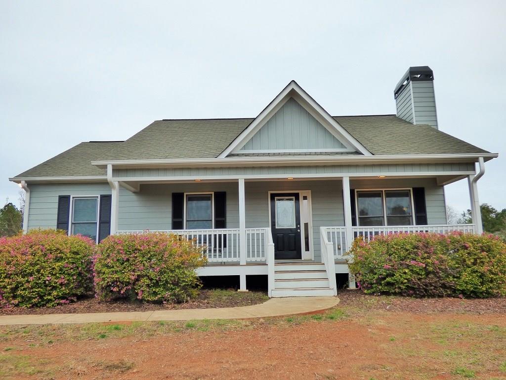 This 3 bed/3 bath raised ranch home sitting on an acre lot is a must see--New hardwood floors throughout-new carpet in bedrooms-freshly painted inside & out-new shutters-recently stained deck-newer energy efficient furnace--You will enjoy entertaining your family & guest in the spacious family/great room which also boasts a lovely trey ceiling & cozy stone fireplace--Kitchen equipped w/Stainless steel appl(refrigerator included)--custom backsplash--stained cabinets--Spacious master suite w/walk in closet--master bath w/double vanity, sep tub & shower.  WELCOME HOME!!!