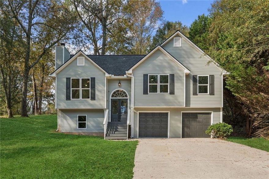 Completely Renovated and Move-In Ready in Bannister Park!
Every inch of this home has been thoughtfully updated with high-quality finishes and modern design. Updates include a new architectural roof, gutters, HVAC system, water heater, energy-efficient windows, garage doors with openers, and both front and rear French doors. Inside, you’ll find new paint throughout, smooth (non-stippled) ceilings, and luxury vinyl plank flooring for a clean, contemporary look.

The chef’s kitchen features brand-new cabinetry, quartz countertops, designer backsplash, updated faucet, and stainless steel appliances — including refrigerator, range, microwave, and dishwasher. The owner’s suite offers a fully renovated bath with new cabinetry, quartz counters, tiled shower, updated faucets, toilet, and freshly painted tub. The secondary bath also shines with new cabinetry, quartz, and fixtures. Additional highlights include new interior hardware, lighting, and ceiling fans, plus repairs and refreshes to both the front porch and rear exterior.

Located in the desirable Bannister Park subdivision, this home is close to top-rated Forsyth County schools, shopping, dining, and GA-400 for easy commuting. A true turnkey property offering peace of mind and style!