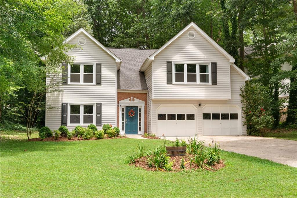 Welcome to 4510 Sagebrush Drive—your charming new beginning in the highly desirable Calumet West community of Kennesaw! Tucked away on a peaceful, tree-lined street, this 3-bedroom, 2.5-bath home sits on a level lot and offers the perfect blend of comfort, style, and convenience in the award-winning Harrison High School District. Step inside to find beautiful Luxury Vinyl Plank flooring that flows throughout the main level. The bright and airy kitchen features classic white cabinetry and a generously sized pantry to keep everything organized. Enjoy your morning coffee in the breakfast nook with lovely views of the front yard. The vaulted Great Room, complete with a cozy gas-starter fireplace, creates a spacious yet inviting atmosphere—ideal for relaxing nights or entertaining guests. The adjacent Dining Area allows everyone to stay connected, whether it's a holiday gathering or a casual weeknight dinner. Or, step outside to your private backyard and patio—perfect for al fresco dining, grilling, or simply unwinding under the shade of mature trees. A sturdy steel shed offers extra storage for yard tools, bikes, or gardening gear. Upstairs, you’ll find a thoughtfully designed layout that enhances both function and privacy. A central landing provides space for additional furniture or a reading nook, along with a conveniently located laundry room. The secondary bedrooms and primary suite are separated by this landing, creating privacy for everyone. The serene Primary Suite features a tray ceiling, two large closets, and a beautifully updated en suite bath with a soaking tub, separate shower, and dual vanities. One Bedroom overlooks the front yard, while the third Bedroom, currently used as an office, enjoys tranquil views of the backyard. Calumet West is an amenity-rich community where every day feels like a staycation. Enjoy lighted tennis courts, a swimming pool with plenty of lounge space, a fun-filled playground, a shaded pergola, a basketball net, and a community firepit—perfect for gathering with neighbors and making memories. With its inviting layout, prime location, and active community, this home is the ideal spot to start your next chapter. Come see what makes 4510 Sagebrush Drive such a special place to call home!