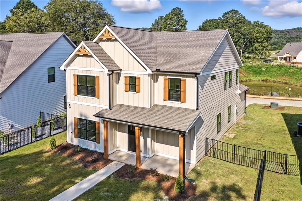 MOVE-IN READY, The Linda, at Ferguson Corners! Fall into savings with 4.99% fixed rate or $20,000 of builder incentives* with September contract. Call us for details! Discover this custom, boutique community by MarDon Construction, offering luxury and exceptional quality. The Linda plan features a spacious main level with custom architectural details throughout. The gourmet kitchen includes stainless steel appliances, quartz countertops, and a large island, perfect for entertaining. The main floor also offers a designer office, mudroom with custom storage, and a covered back patio. Upstairs, you'll find all 4 bedrooms and a laundry room, with the owner's suite showcasing a custom tray ceiling, large walk-in closet, and a spa-like en suite. Just minutes from Downtown Emerson, Cartersville, and Redtop Mountain, this neighborhood blends style with high-end finishes. *The incentive is subject to lender and government restrictions. The offer is subject to change or may be discontinued. Your actual mortgage interest rate, APR, and closing costs may vary based on the loan product, your application and qualifications, and based on applicable closing costs and fees.*
