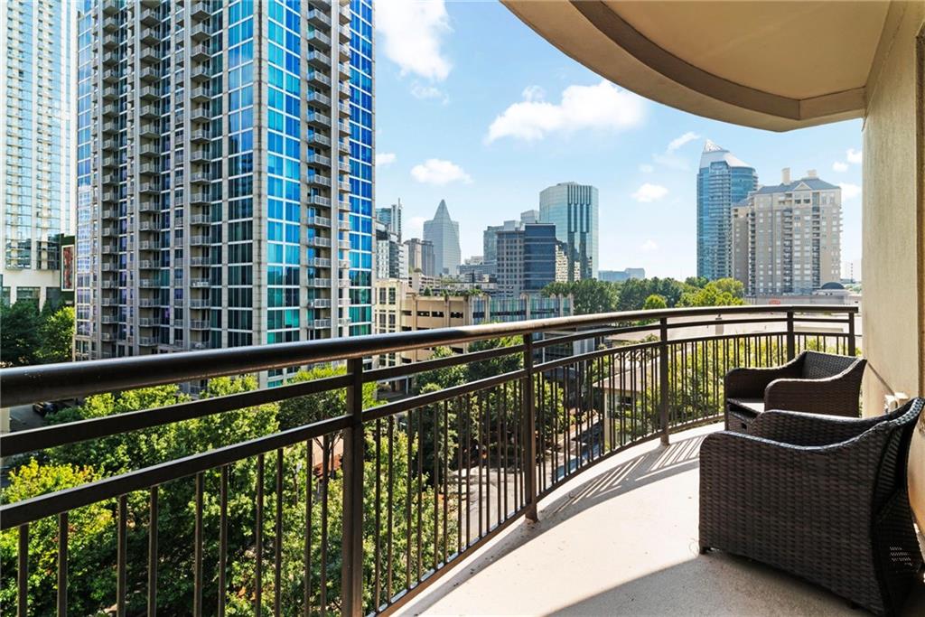 Welcome to refined high-rise living in the heart of Buckhead. This sunlit corner residence blends contemporary style with timeless elegance, offering the perfect balance of comfort and sophistication. From the moment you enter through the welcoming foyer, you’re greeted with wide-plank luxury vinyl flooring that flows seamlessly throughout the home. The thoughtfully designed layout includes a dedicated dining area and a spacious great room framed by floor-to-ceiling picture windows ideal for both lively entertaining and quiet evenings at home. The updated kitchen features a wine rack, granite countertops, modern cabinetry, and newer appliances. The owner’s suite boasts an oversized closet, while the flexible den provides the perfect space for a home office, library, or guest retreat. Step outside to your expansive corner balcony and savor breathtaking views that transform daily living into a resort-like experience.
Life here extends far beyond the walls of your home. Enjoy mornings with coffee from the resident café bar, afternoons lounging by the sparkling pool with private cabanas, and evenings hosting friends in the wine room or private movie theater. For wellness and recreation, a state-of-the-art gym and elevated tennis court await. Use the grill to make steak dinners or roast marshmallows over the fire pit. It's all there for your enjoyment. When work calls, multiple conference rooms provide stylish, professional spaces steps from your front door. With 24-hour concierge service, secure covered parking, and lush landscaped grounds, every detail of this community has been designed to elevate your lifestyle.
Marta, Lenox Mall and Phipps Plaza, and much more upscale restaurants, hotels and shopping are steps away from your front door. Georgia 400 and Interstates 75/85 are mere minutes away as you make your way to various destinations.
Living here means more than owning a home, it’s access to a curated way of life. This Buckhead address places you near Atlanta’s finest dining, shopping, and cultural destinations, all while offering a serene retreat above the city.