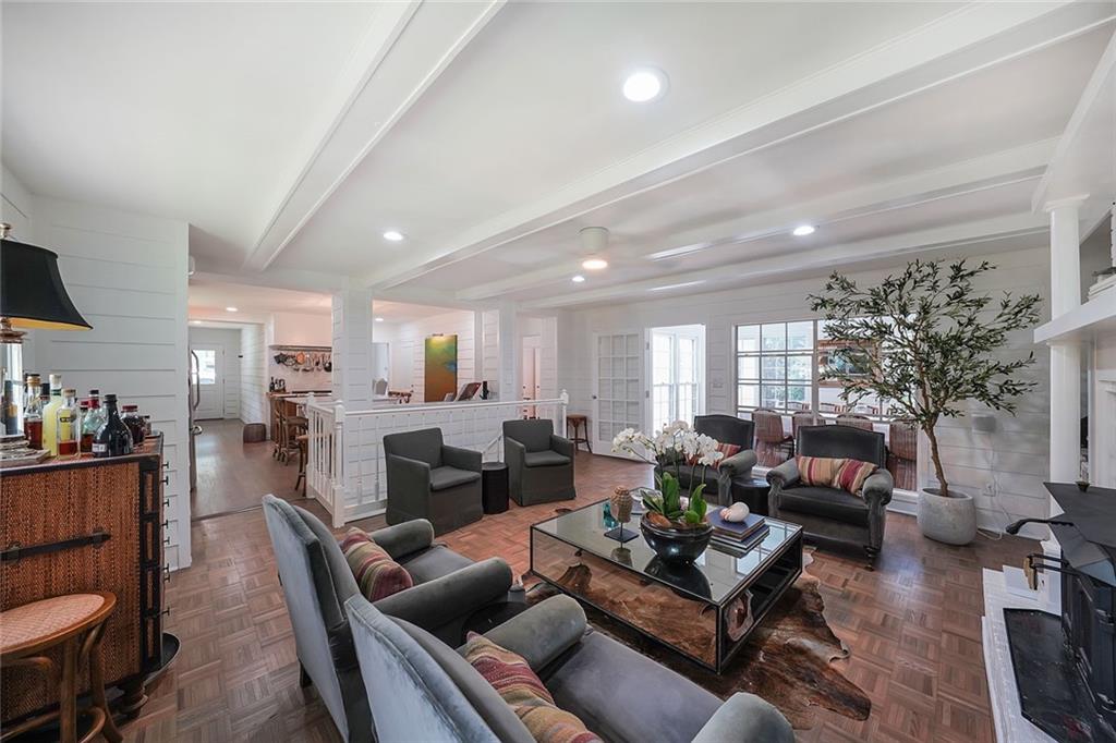 Step onto a quiet, tree-lined street just ten minutes on foot from Decatur Square and discover this turnkey, fully remodeled gem!
Spanning approximately 3,500 square feet across three light-filled levels, this home offers effortless flow and refined design. Two generous lounges open to both formal and casual dining areas, all centered around a chef-grade kitchen featuring striking marble countertops and stainless steel accents.
With five bedrooms and three beautifully finished full bathrooms, each space is intimate in scale yet rich in designer detail. Just off the stunning courtyard and backyard, you'll find a versatile family room that can seamlessly serve as a fourth bedroom, home office, or creative studio— perfect for flexible modern living.
The expansive basement, complete with its own laundry area, offers endless possibilities—perfect for a home gym, game room, media lounge, or all three. On the upper level, a nearly 600 sq ft attic awaits your vision. With electric and plumbing already in place, it’s primed to become a stunning fifth bedroom with a fourth bathroom—ideal for a luxurious primary suite or a peaceful private retreat.
The manicured 0.27-acre lot extends the living experience outdoors, offering serene spaces for entertaining, gardening, or unwinding. With updated HVAC, plumbing, and electrical systems throughout, this home is
move-in ready with peace of mind built in.
Modern Decatur living—convenience, style, and flexibility, all in one irresistible address.
