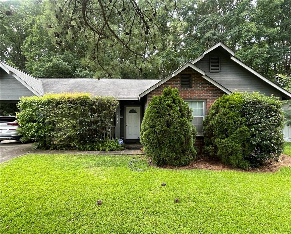 This 3-bedroom, 2-bathroom well-kept charmer is conveniently located near shopping, dining, and entertainment. Let’s start with the covered front porch which is a lovely space for sipping morning coffee or afternoon tea. Step inside onto stylish laminate flooring featured throughout most of the home and neutral paint color, adding a modern touch. This residence boasts vaulted ceilings in the mail living areas and high ceilings in the other rooms, creating an open and airy feel. Spacious yard is perfect for outdoor relaxation and entertaining. With newer water heater and all systems functioning, this home is turnkey! Enjoy the convenience of ample off-street parking on the extended driveway and covered carport. Ideal opportunity for an owner-occupant who is ready to bring their vision to customize this home…or an investor looking for their next great deal! With quick access to Interstate 285, Hartsfield-Jackson Atlanta International Airport, and Herbert Greene Nature Preserve, this home places the best of the city at your fingertips. Schedule a tour today!