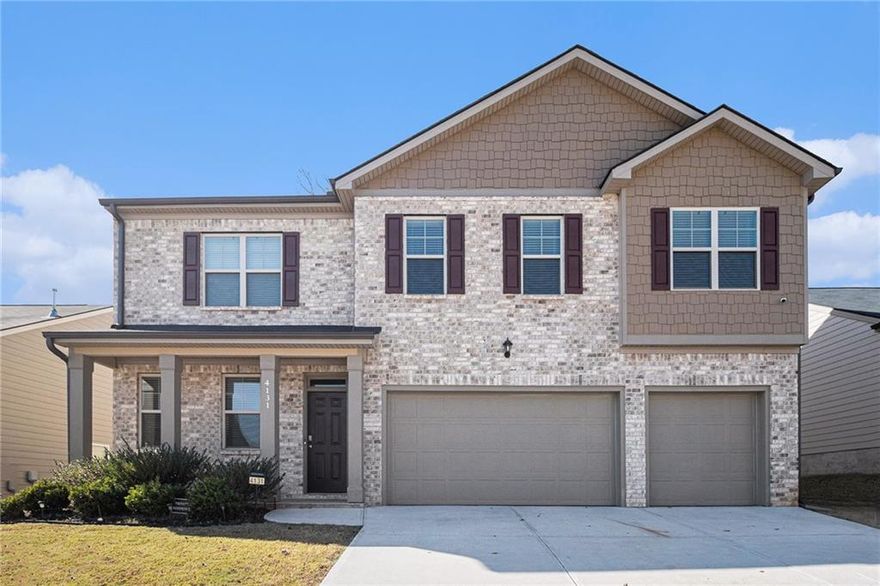 5.75% Assumable FHA with Roam! Absolutely beautiful two-story home in the desirable Enclave at Flat Rock Hills! This spacious 5BR/5BA home offers a flexible layout with a formal living and dining area (currently a game room), a cozy family room with fireplace, and an open eat-in kitchen with island and pantry. The main level also features a guest bedroom, full bath, and half bath. Upstairs boasts a loft perfect for an office or entertainment space, plus three secondary bedrooms and a luxurious primary suite with dual sinks, separate tub/shower, and walk-in closet. Enjoy outdoor living on the covered patio overlooking the fenced backyard. Community amenities include a pool, playground, tennis courts, and more! Conveniently located near I-20, Arabia Mountain Nature Preserve, Stone Mountain Park, Brownsmill Park, walking/biking trails, and Stonecrest Mall.