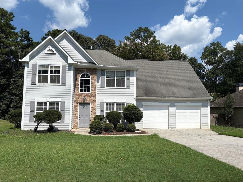 Enjoy stunning lake views right from your backyard in this beautifully maintained home, ideally situated in a sought-after swim/tennis community within the award-winning North Gwinnett School District. The main level features gleaming hardwood floors, a spacious open-concept kitchen with a clear view into the inviting family room, and a cozy fireplace—perfect for both everyday living and entertaining. A formal dining room and a versatile living room, ideal as a home office, add even more flexibility to the layout. Upstairs, you’ll find two generously sized secondary bedrooms and a large flex room that can serve as a fourth bedroom, media room, or playroom. The oversized master suite is a true retreat, complete with a tray ceiling and an expansive sitting area. With its unbeatable location—just a short walk to Riverside Elementary and Settles Bridge Park—this home offers the perfect balance of comfort, convenience, and community.