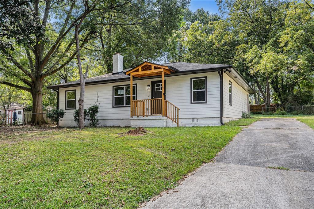 Modern upgrades meet everyday comfort in this fully renovated Forest Park home featuring 3 bedrooms, 2 bathrooms, and a versatile bonus room with endless possibilities. Whether you need a private home office, playroom, workout space, or extra guest suite, this home adapts to your lifestyle with ease.
Step inside to an inviting open floor plan filled with natural light. The living room showcases fresh flooring, recessed lighting, and a beautifully updated stone fireplace that creates the perfect gathering spot. The kitchen is a showstopper with white shaker cabinets, quartz countertops, stainless steel appliances, subway tile backsplash, and a large center island that makes cooking and entertaining effortless. Both bathrooms have been completely remodeled with modern finishes, new vanities, and sleek tile work, offering a spa-like experience every day. The primary suite provides comfort and privacy, while the additional bedrooms give plenty of flexibility for family, guests, or hobbies. Outside, the leveled backyard is a true highlight, ideal for entertaining, gardening, or creating your own outdoor oasis. With space to relax and room for play, it is a yard designed to be enjoyed year-round.
Every corner of this home has been thoughtfully updated, including flooring, lighting, fixtures, and paint, making it completely move-in ready. Perfectly located near schools, shopping, dining, and major highways, this home delivers both style and convenience in one complete package.