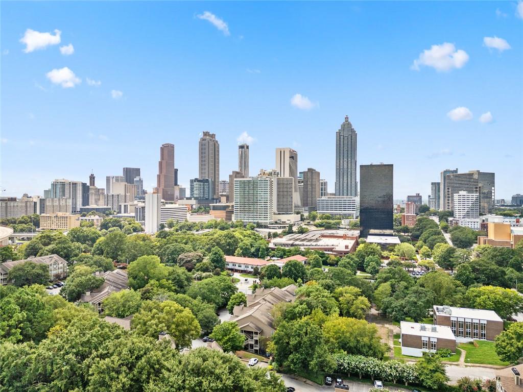 Enjoy stunning skyline views from this 1-bedroom, 1-bath condo on the 14th floor of City Heights. Featuring floor-to-ceiling windows, a private balcony, and an open layout, this bright unit offers modern city living in one of Atlanta’s most dynamic neighborhoods. Amenities include a 24-hour concierge, fitness center, Olympic-sized pool, gated parking, and a private park. Located minutes from the Belt Line, Ponce City Market, and Midtown.