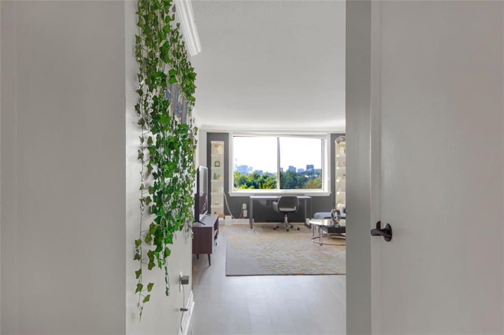Buckhead Condo with amazing City Views! This perfectly located home will have you at "hello" with it's new flooring, paint, carpeting and updated white kitchen with included refrigerator and washer& dryer! Large master with pool and city view as well! Great active community with swimming pool. gym, recreational/entertainment center with lounge/pool table, and free WIFI! Walk to everything... great access to MARTA, shopping, entertainment and enjoy a walk through the park over to Duck Pond! This is the best of what ATL has to offer ...
