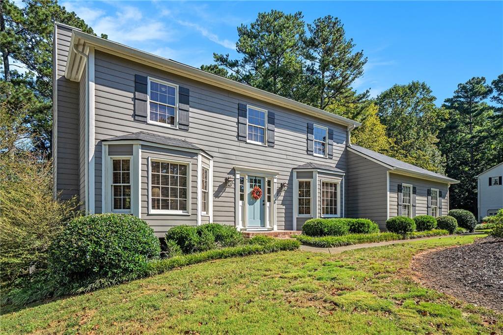 Immaculately Maintained Home in Huntington Subdivision
Welcome to this beautifully maintained traditional-style 3-bedroom, 2.5 bath home in the desirable Huntington subdivision of Lilburn. Conveniently located near shopping, schools, and recreation, this home combines comfort, style, and functionality.
Inside, you’ll find real hardwood floors throughout the main level, a spacious formal dining room, and a cozy family room with a gas log fireplace. The updated eat-in kitchen features granite countertops, stainless steel appliances, and ample cabinet space. A large screened-in porch extends the living area and is perfect for outdoor entertaining year-round.
All bedrooms are privately located upstairs, including the generously sized primary suite with a stunning ensuite bathroom featuring a designer double vanity and walk-in shower.
Recent updates add peace of mind, including all bathrooms stylishly updated, a new roof, a 6-year-old HVAC system, a 4-year-old water heater, and a redone deck with brand-new screens. The property also offers an outdoor storage shed.
As a bonus, Huntington subdivision offers an optional pool membership for summer enjoyment.