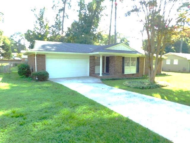 Spacious brick ranch with fenced in backyard. An entry foyer leads to an open plan with a living room, separate dining room, kitchen with grey cabinets, Granite counters, tile backsplash, white appliances (microwave, electric stove, dishwasher, refrigerator) and panty. There is a large breakfast area with access to the rear Sunroom. There are two spare bedrooms with ceiling fans and a full hall bath with tub/shower combination. Master bedroom has a ceiling fan and attached full bath with single vanity and shower only. The home has a large fenced in backyard with a shed for storage. There is a 2-car front entry garage. Close proximity to Cumberland Mall & Galleria, the Battery, Truist Park, Marietta Square, and a variety of shopping and dining. Landscaping is included with the rent!