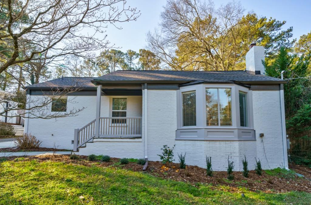 Experience this adorable Bungalow nestled between Midtown and Buckhead, yet tucked away in a peaceful and serene setting. Easy access to the new Uptown Atlanta district, the financial district of Buckhead and numerous award-winning restaurants and shopping! Oversized primary bedroom and spacious ensuite bathroom provide the comfort and privacy we all want. Gourmet kitchen with separate dining space, but also a bar-top island provides multiple options to dine-in. Cozy living area with fireplace just steps off of the kitchen provides for easy entertaining! Updated 2nd bath with easy access to the 2 additional guest bedrooms, which are separated from the primary bedroom. Large backyard is fully fenced in and allows room to play for the furry ones or the little ones. Kroger, Target, Best Buy and Home Depot are less than a mile away! Come experience city living without the city feel! Please note the home is being leased unfurnished.