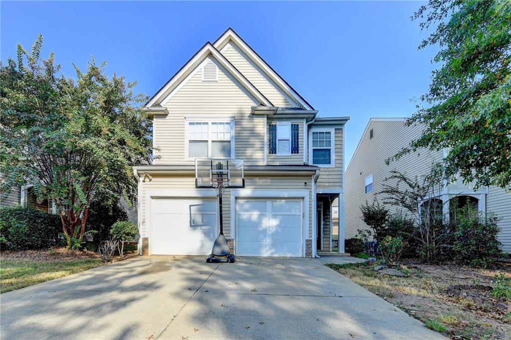 This home is filled with character and comfort, offering stylish tile flooring, large windows that bring in abundant natural light, and a cozy brick-accented fireplace. The kitchen comes equipped with updated appliances, ample counter space, and plenty of cabinets for storage. Step outside to enjoy the spacious back patio—perfect for entertaining guests or simply relaxing in peace.