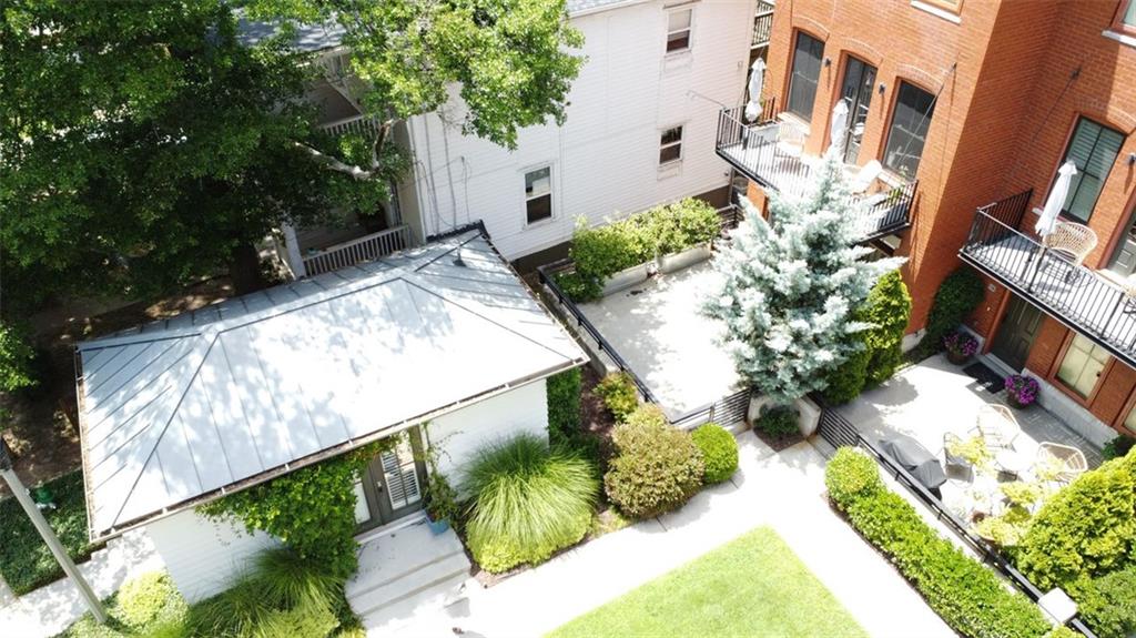 Urban Townhouse with Detached Live-Work Studio – A Rare Opportunity ...
Welcome to this unique and versatile Decatur townhouse featuring a detached live-work auxiliary building – perfect for entrepreneurs, creatives, or anyone seeking flexible space for business or lifestyle needs.
Located in a vibrant, walkable neighborhood, this stylish home combines residential comfort with exceptional functionality. The main residence boasts an open-concept floor plan, contemporary finishes, and abundant natural light throughout. The gourmet kitchen includes stainless steel appliances, quartz countertops, and a spacious island – ideal for entertaining or everyday living. Parking in the city is not an issue, with a spacious 2-car garage and ample street parking.
Steps from the main home, with direct street frontage, the auxiliary building offers a fully finished space with its own entrance, heating/cooling, and bath – ideal for a professional office, art studio, wellness practice, music practice room, or guest suite. The auxiliary building is zoned for mixed-use or live-work (conforming with local zoning and HOA restrictions).
This is more than a home – it's a lifestyle upgrade with income and creativity potential built in. Schedule a tour today!