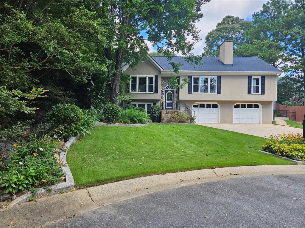 Spacious 4-Bedroom Home with Bonus Rooms in East Cobb’s Top-Rated School District!
Welcome to your perfect East Cobb rental—located in a quiet cul-de-sac and zoned for all 10/10-rated schools! This beautifully updated home blends comfort, function, and style, offering everything you need and more.
Step into a bright and open layout featuring a large living room with a cozy fireplace, a separate dining area, and an additional family room—ideal for gatherings or quiet evenings. The kitchen boasts granite countertops and stainless steel appliances, perfect for cooking and entertaining.
This home also includes a very large, versatile sunroom/flex space. This split-level home has a bedroom, a closet, and half bath in the basement, which can be converted to an office, playroom, gym, or guest suite.
Enjoy your morning coffee or host summer barbecues on the expansive wraparound deck overlooking a private, landscaped backyard oasis. Freshly painted deck.
Additional highlights:
Washer & dryer included
Fresh paint on deck and hardwood floor
Wider-than-standard 2-car garage (fits like a 3-car!)
Ample storage space
Top East Cobb schools: all rated 10/10!
With 4 spacious bedrooms and multiple flexible living areas, this move-in-ready home truly has it all. Don’t miss your chance—schedule your tour and make this stunning rental yours today! Tenant pays for the lawn care