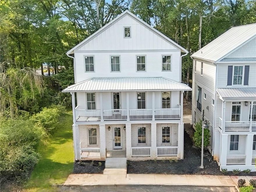 Welcome to 101 Adair Walk - where community and convenience meet in the heart of Downtown Woodstock! This stunning 4-bedroom, 3.5-bath home offers 2,718 sq ft of modern comfort in one of the most sought-after neighborhoods in Cherokee County. Built in 2022, it combines stylish design with everyday functionality, but what truly sets it apart is the location. Step outside your door and you're just moments from Downtown Woodstock's shops, restaurants, coffee houses, and live entertainment. Whether it's a weekend stroll to the farmers market, dinner at a favorite local spot, or catching a concert at the amphitheater, living here means being part of the energy and charm of this vibrant community. Inside, you'll enjoy an open-concept floor plan with 9' ceilings, hardwood floors, and a chef's kitchen featuring stone counters, stainless appliances, and a spacious island that flows into the family room. The owner's suite offers a spa-like retreat with a double vanity and walk-in shower, while secondary bedrooms provide plenty of space for family, guests, or a home office. With a private patio, two-car garage, energy-efficient features, and sidewalks throughout the community, this home is designed for both comfort and connection. 103 Adair Walk isn't just a home - it's a lifestyle. Live steps away from everything Downtown Woodstock has to offer.