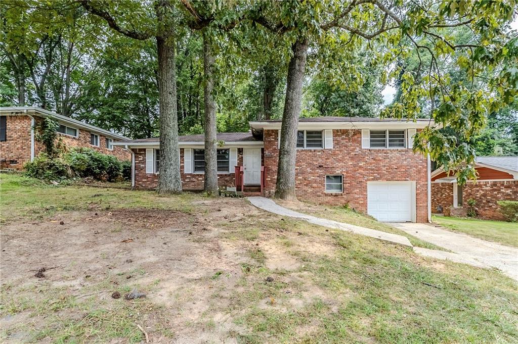 Welcome to this charming split-level home in the Tucker Heights community. Offering 3 bedrooms and 2 baths, this home is thoughtfully laid out with comfortable living spaces ideal for both relaxation and entertaining. The main level includes a spacious great room and a separate dining area, creating a warm and inviting flow. Upstairs, you’ll find well-sized bedrooms that provide privacy and functionality for everyday living. The partial basement adds bonus space that can be customized for storage, a home office, or recreation. Schedule a showing today. One or more photos have been virtually staged.