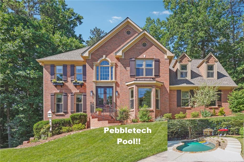 Price improvement!!!
Immaculately maintained by its original owner, this pristine home located on a cul de sac in a lakeside community, offers an outdoor oasis complete with a heated pebbletech pool featuring a Kool Deck surface and a convenient pool house with a bathroom. Renovations abound, including a full kitchen and master bath remodel. Entertaining is a breeze on the main level, with spacious living areas easily flowing seamlessly to the covered and screened porch where you can relax and soak in the ambience of your private, nature filled haven. The master suite showcases a light-filled getaway with high-end fixtures, a luxurious cast iron soaking tub and a trendy glass & marble shower. Enjoy the comfort of top-of-the-line Pella windows and custom doors, along with the timeless elegance of solid hardwoods throughout. The finished basement boasts an office/flex room, a poker/gaming area, and ample storage. Award winning Flowery Branch High Schools cluster or less than 10 minutes to Buford schools. Walking distance to boat ramp. The spacious 3 car garage has additional parking available for RVs, boats, or campers complete with power and a waste station. Indulge in the ultimate blend of sophistication and functionality in this idyllic retreat. Pool season is here!!