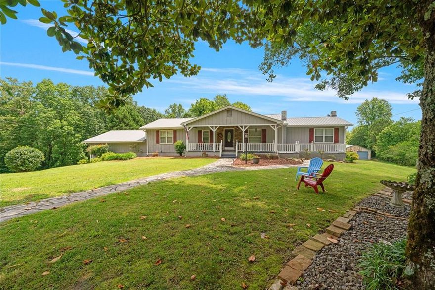 70k UNDER Appraisal! Instant Equity on 6.42 Acres with Workshop & Pole Barn! 
Recent independent appraisal valued this property at $495,000 — 

This 3-bedroom, 2-bath ranch sits on 6.42 private acres with no HOA and endless possibilities. A powered workshop with dual roll-up doors plus a covered pole barn make it ideal for hobbyists, contractors, RV/boat owners, or anyone needing serious storage.

Inside, you’ll find a warm and inviting layout with hardwood floors, a cozy brick fireplace with gas stove insert, and a spacious kitchen with solid wood cabinetry. Vintage touches give you the perfect base to update and make your own — without overpaying.

Enjoy mornings on the rocking-chair front porch, evenings in the screened-in back porch, and plenty of open land for gardening, animals, or outdoor fun.