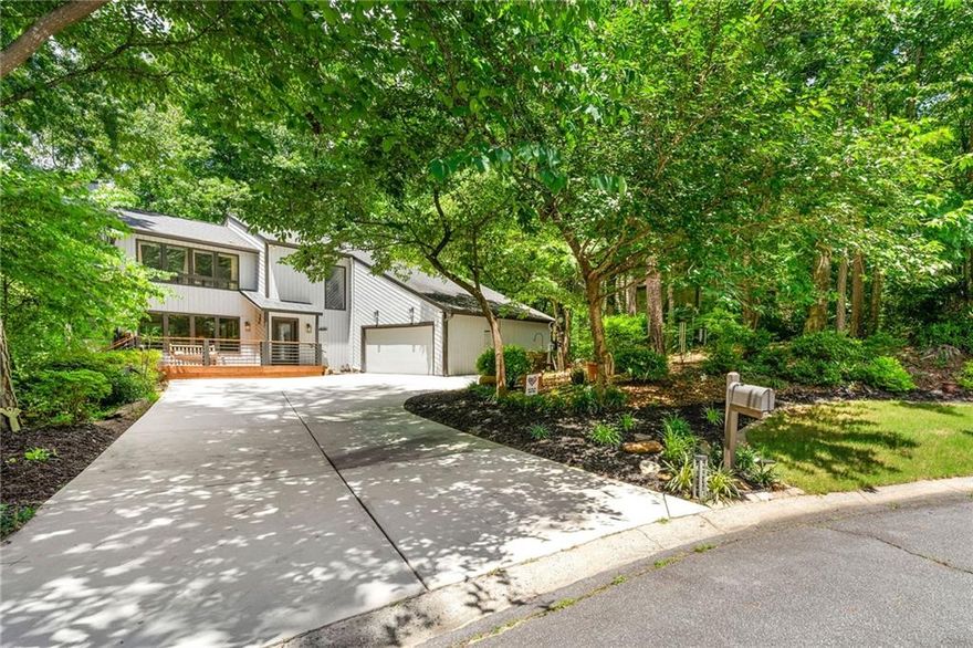 Nestled in a quiet cul-de-sac on a level lot in the highly sought-after lake community of Loch Highland, this home combines contemporary curb appeal with a warm, traditional interior while blending effortlessly into the peaceful, mountain-like surroundings of one of East Cobb’s most scenic and established neighborhoods. Inside, the home features a fireside family room, a crisp white kitchen, and a separate dining area—perfect for everyday living or entertaining guests. Upstairs, you'll find spacious secondary bedrooms and an inviting owner’s suite with a beautifully renovated bathroom completed within the past two weeks. The finished basement provides even more space for entertaining or relaxing. Outdoors, the fun continues with space for games like cornhole and bocce ball, a side yard perfect for a playground and a deck made for grilling and watching the sunsets. Nature lovers will delight in frequent visits from deer, foxes, owls, hawks, and bunnies, and the home is an easy walk to the lake & amenities. Loch Highland is more than a neighborhood—it's a lifestyle. The HOA offers amenities such as swimming pools, tennis courts, a fishing lake, and a playground, all just minutes from top-rated Lassiter High School, shopping, and dining. With the roof, driveway, and water heater all replaced in the last 5 years plus more upgrades too long to list here, this home offers peace of mind and lasting value. Don’t miss your opportunity to own a home in one of East Cobb’s most beloved lake communities.